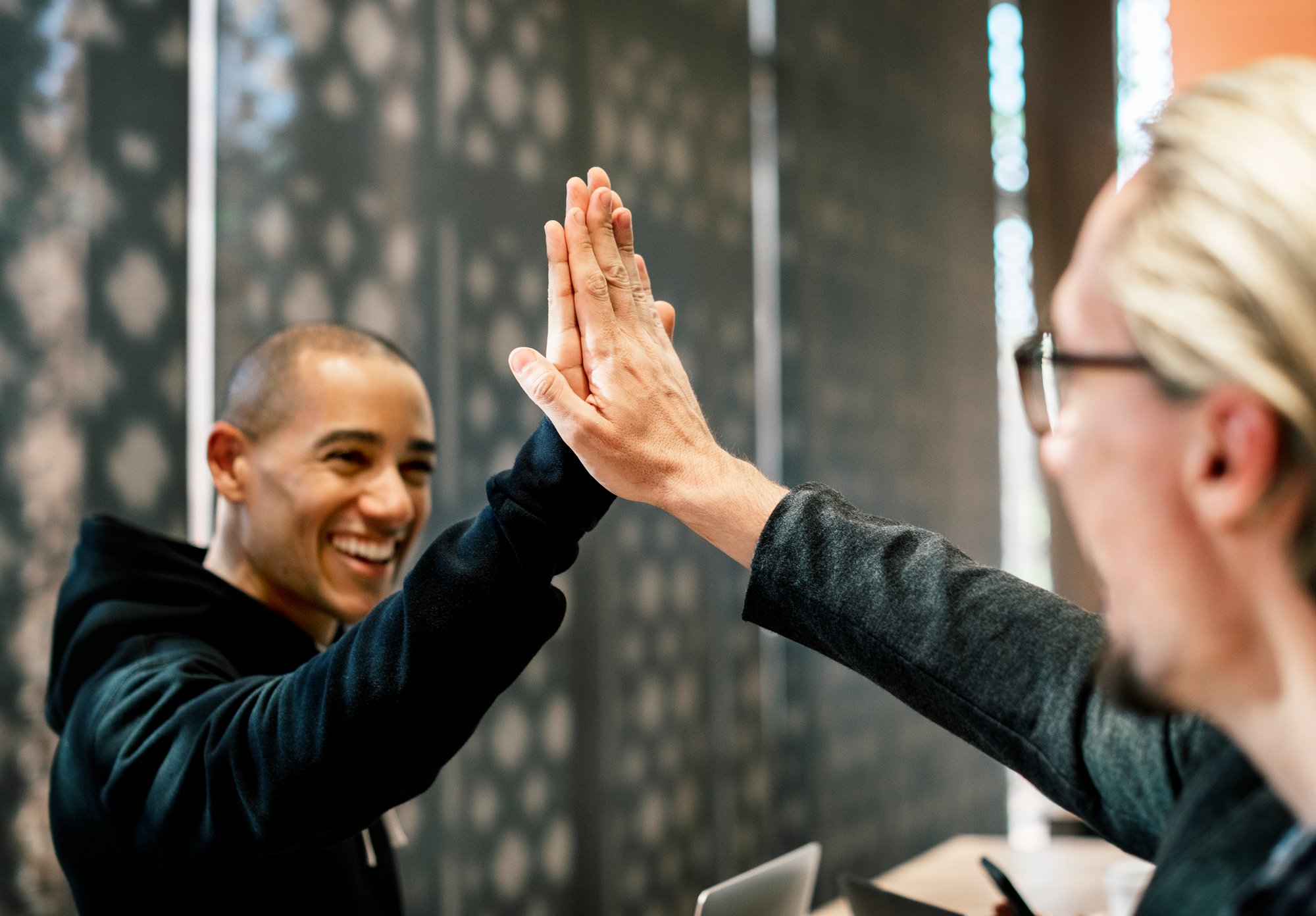 colleagues-giving-high-five